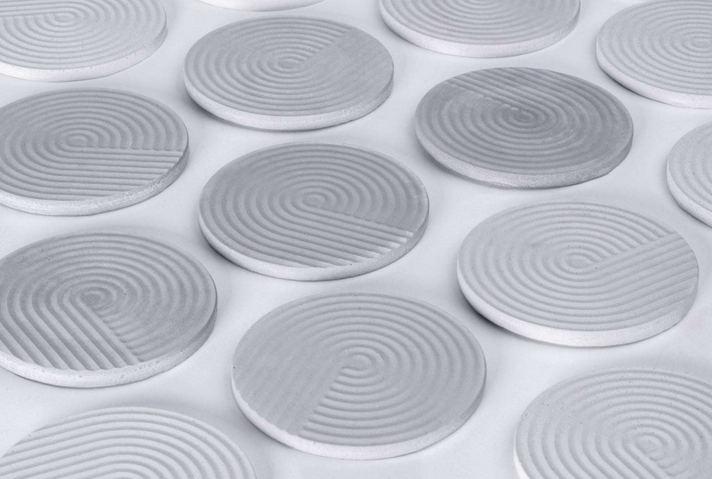 Concrete coaster set, grey by Daniel Lakos