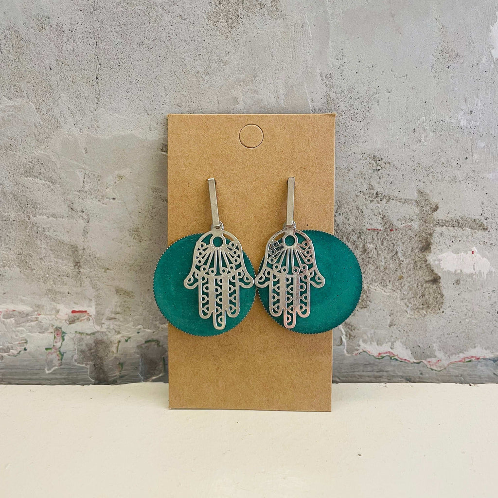 Chamsa earrings with an aquamarine, round concrete piece by Stef.co