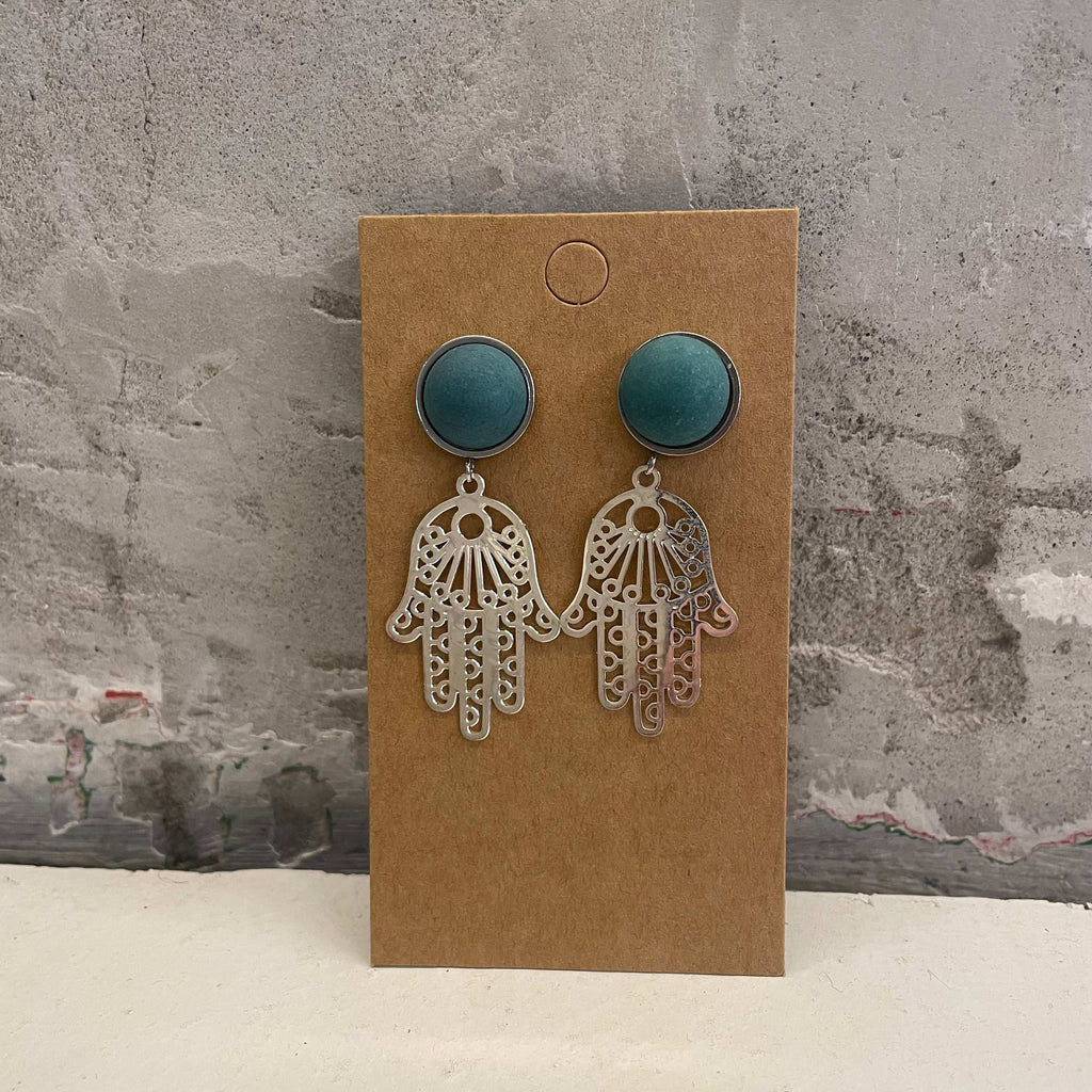 Chamsa earrings with an aquamarine, round concrete piece by Stef.co