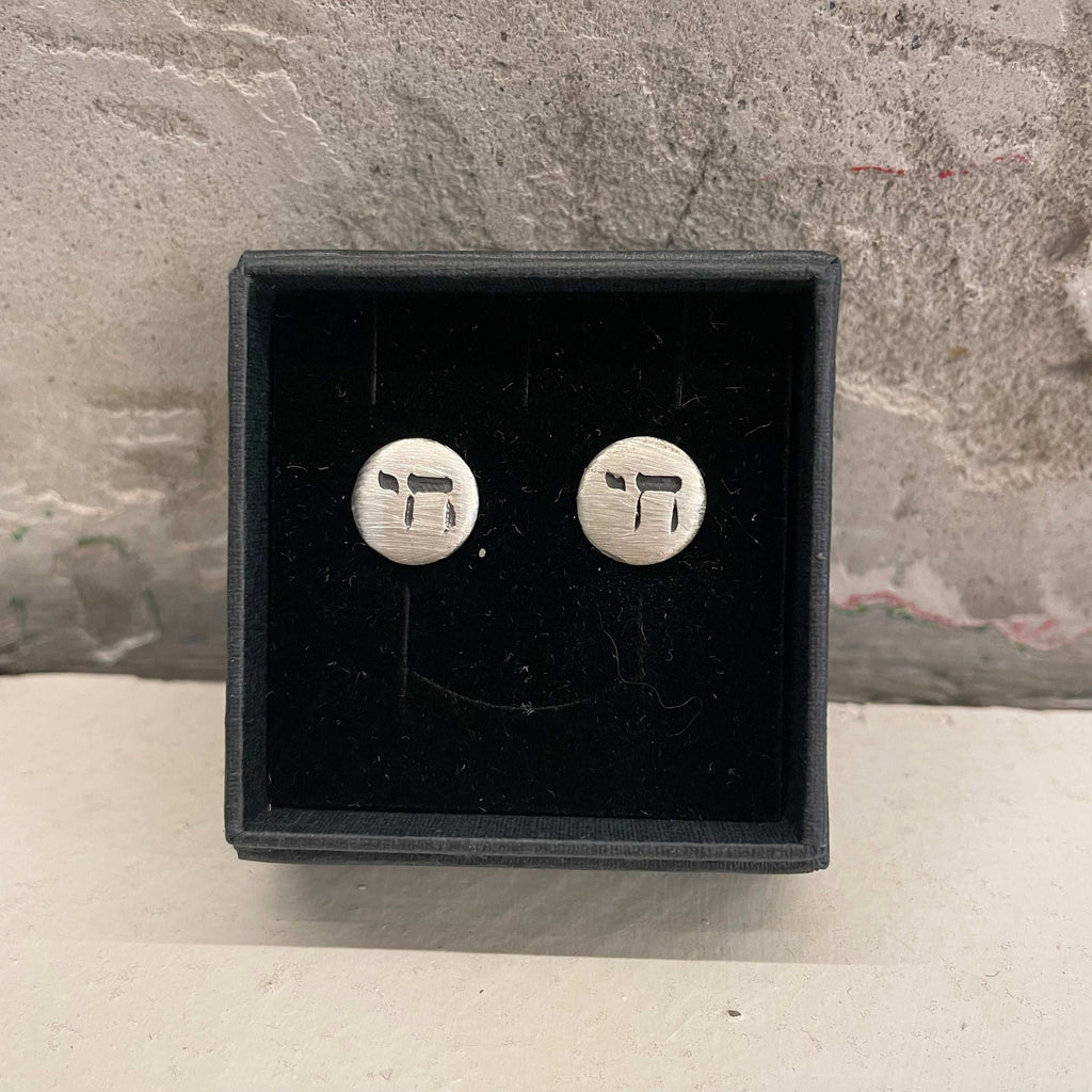 Takama silver earrings with different symbols