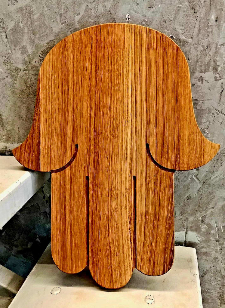 Chamsa shaped cutting board